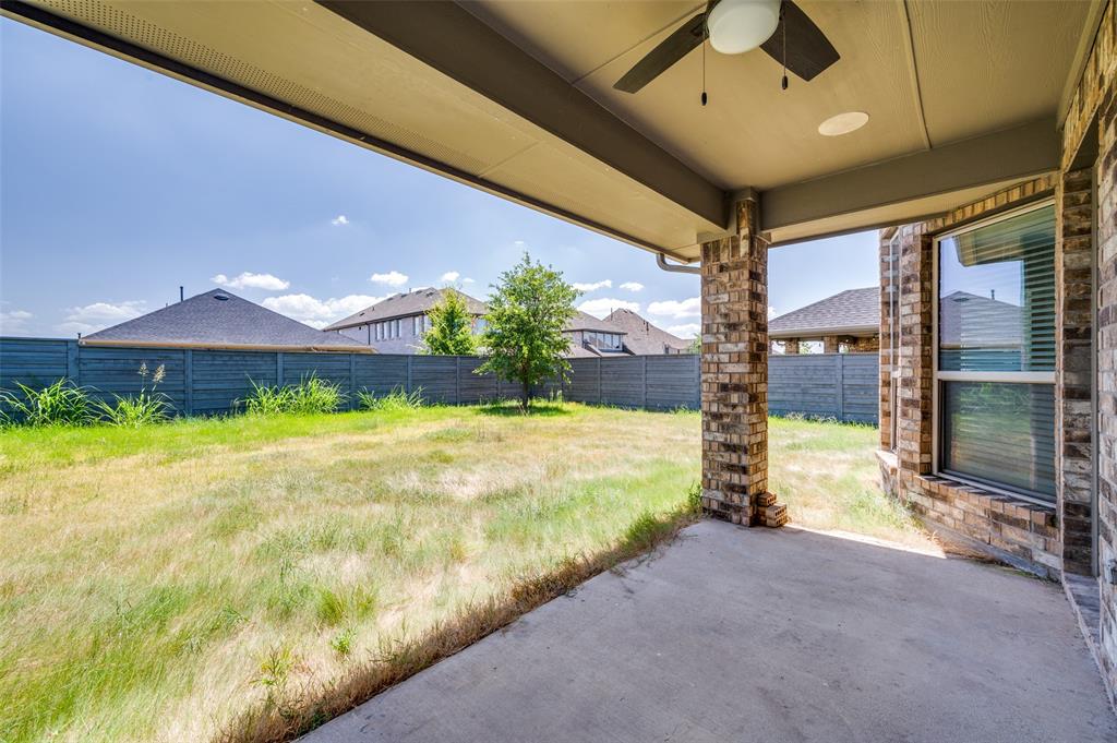 7025 Trailhead Street Little Elm, TX 76227 - Photo 24 of 25 a view of a porch with a yard