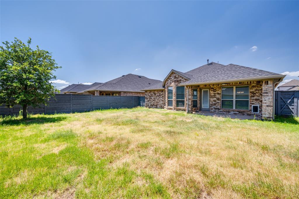7025 Trailhead Street Little Elm, TX 76227 - Photo 25 of 25 a front view of a house with a yard
