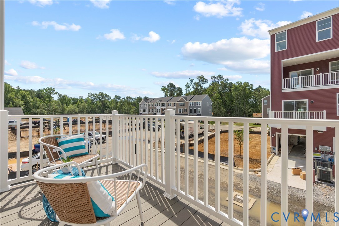 3611 Edna Path, Unit A Richmond, VA 23233 - Photo 30 of 32 a view of a balcony with chairs