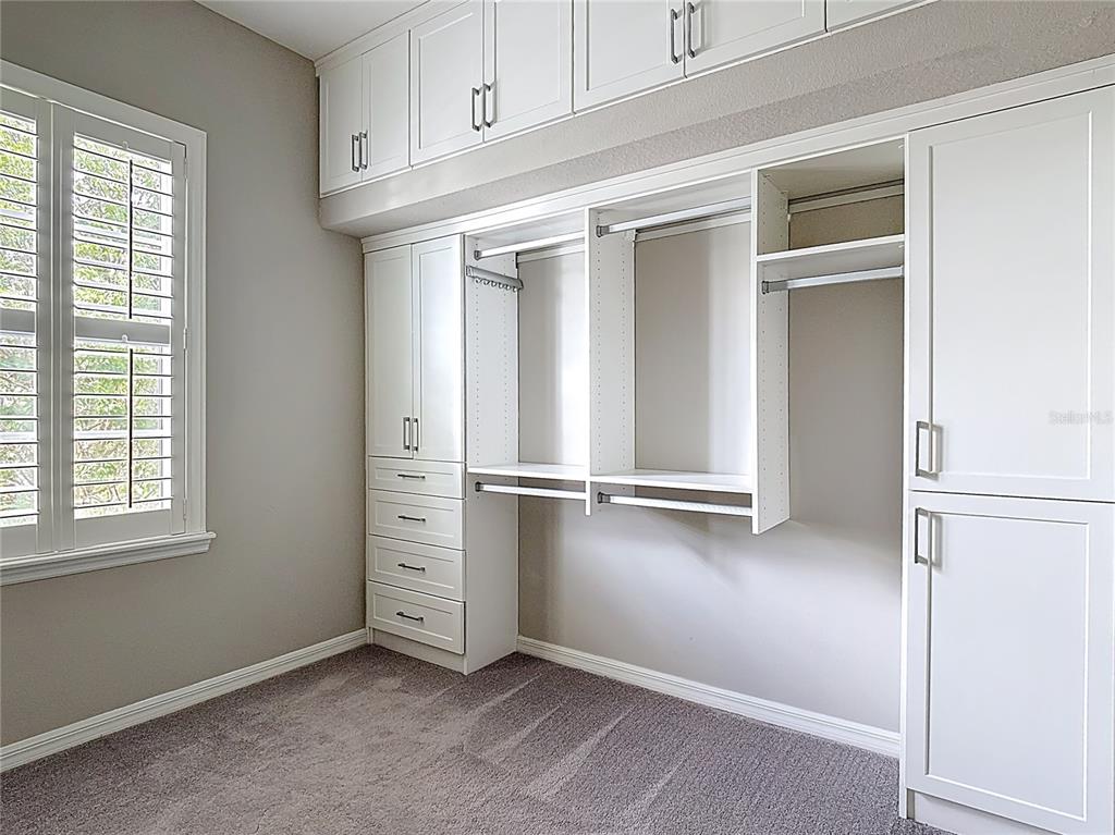 1513 Resolute Street Celebration, FL 34747 - Photo 31 of 43 an empty room with windows