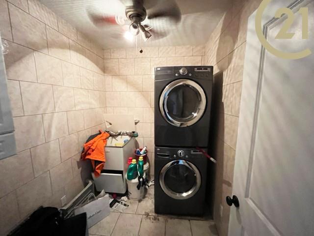 2425 Kings Highway, Unit 8E Brooklyn, NY 11210 - Photo 6 of 9 a utility room with sink dryer and washer