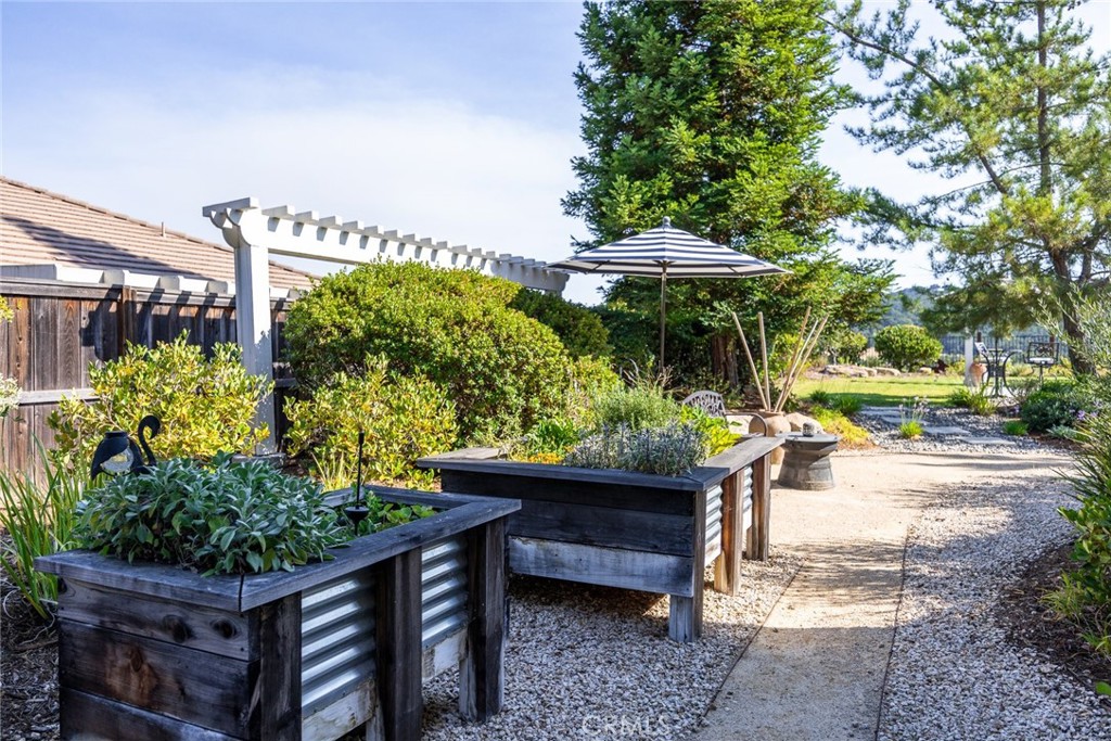 1549 Via Rojas Templeton, CA 93465 - Photo 21 of 29 a view of a patio with table and chairs and potted plants