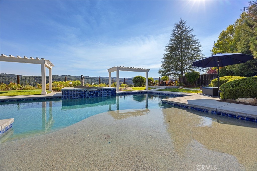 1549 Via Rojas Templeton, CA 93465 - Photo 3 of 29 a view of swimming pool with outdoor seating