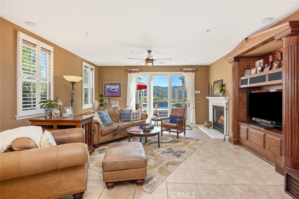 1549 Via Rojas Templeton, CA 93465 - Photo 8 of 29 a living room with furniture tv and large window
