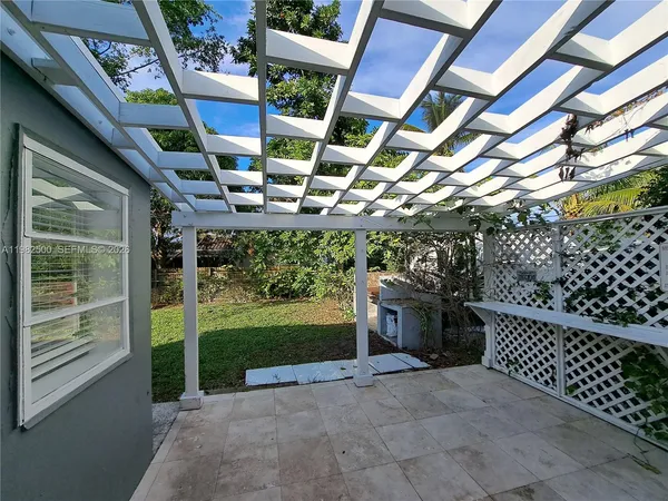 a view of a porch with furniture