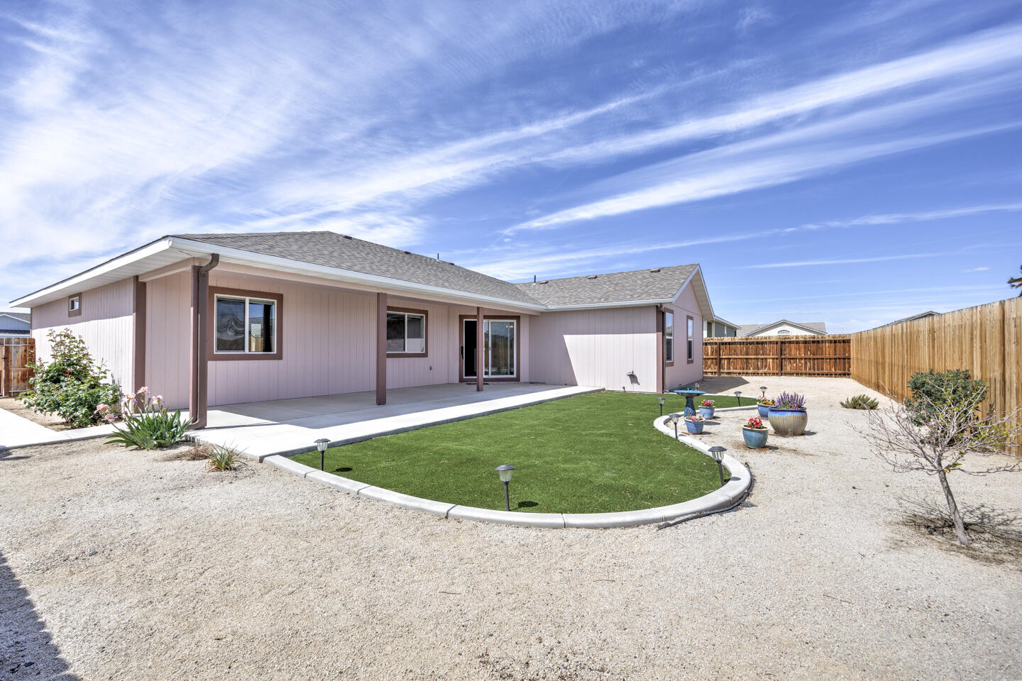 772 Megan Way Fallon, NV 89406 - Photo 18 of 22 a view of a house with backyard and sitting area