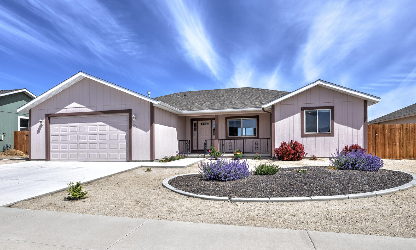 772 Megan Way Fallon, NV 89406 - Photo 22 of 22 a front view of a house with porch yard and outdoor seating