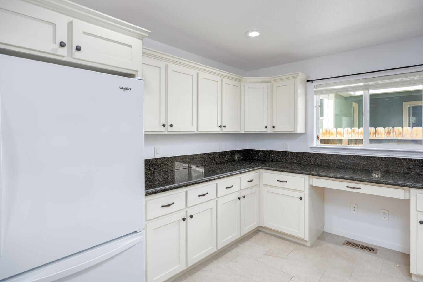 772 Megan Way Fallon, NV 89406 - Photo 7 of 22 a kitchen with granite countertop white cabinets and white appliances