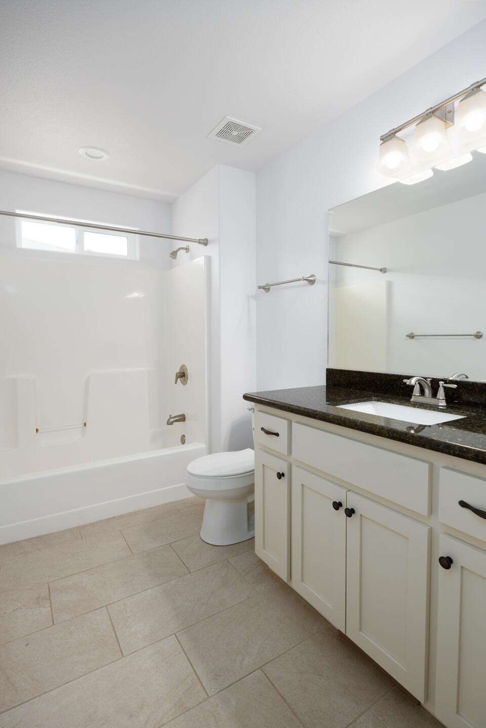 772 Megan Way Fallon, NV 89406 - Photo 10 of 22 a bathroom with a double vanity sink toilet and shower