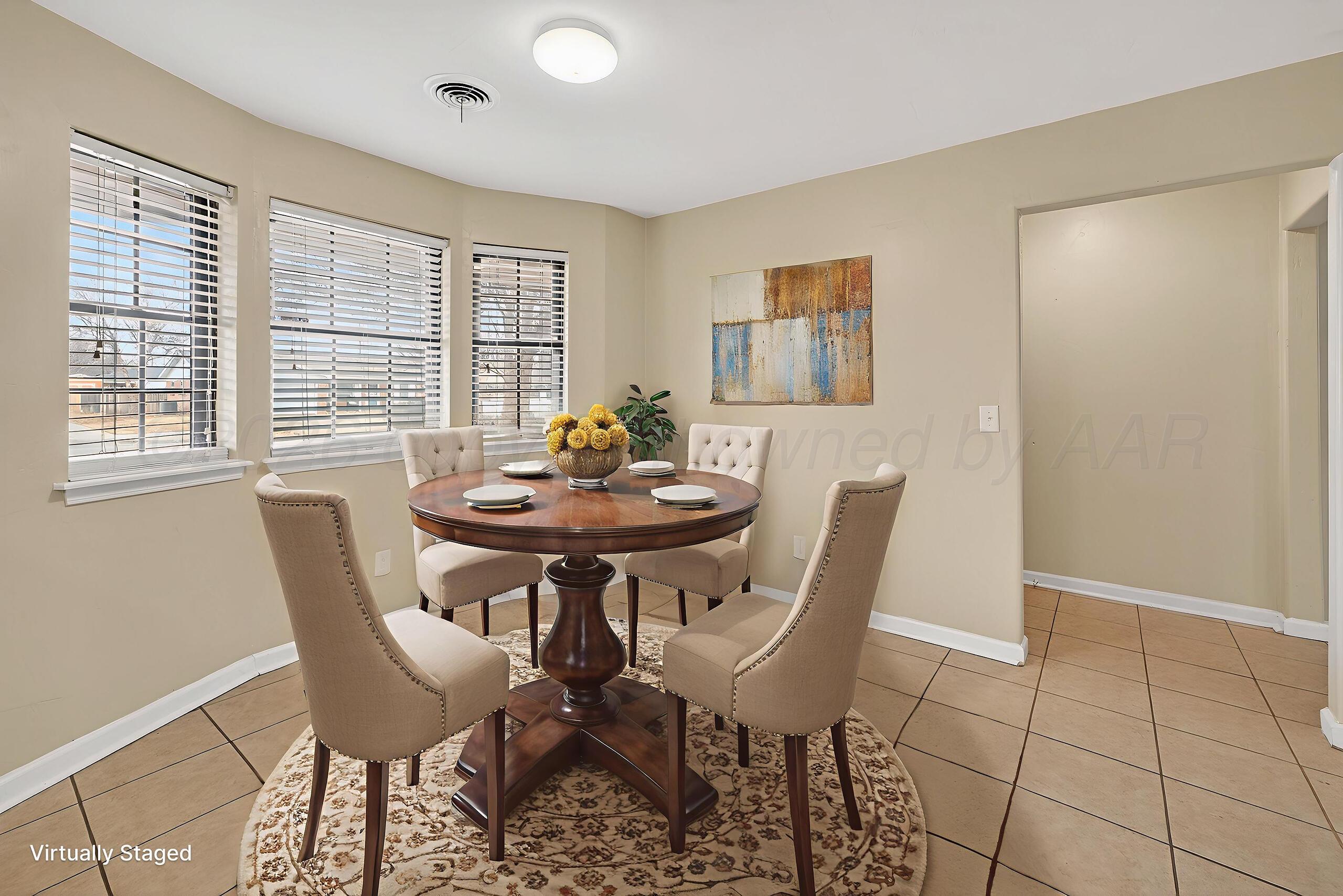 7313 Holyoke Trail Amarillo, TX 79121 - Photo 19 of 56 a view of a dining room with furniture and window