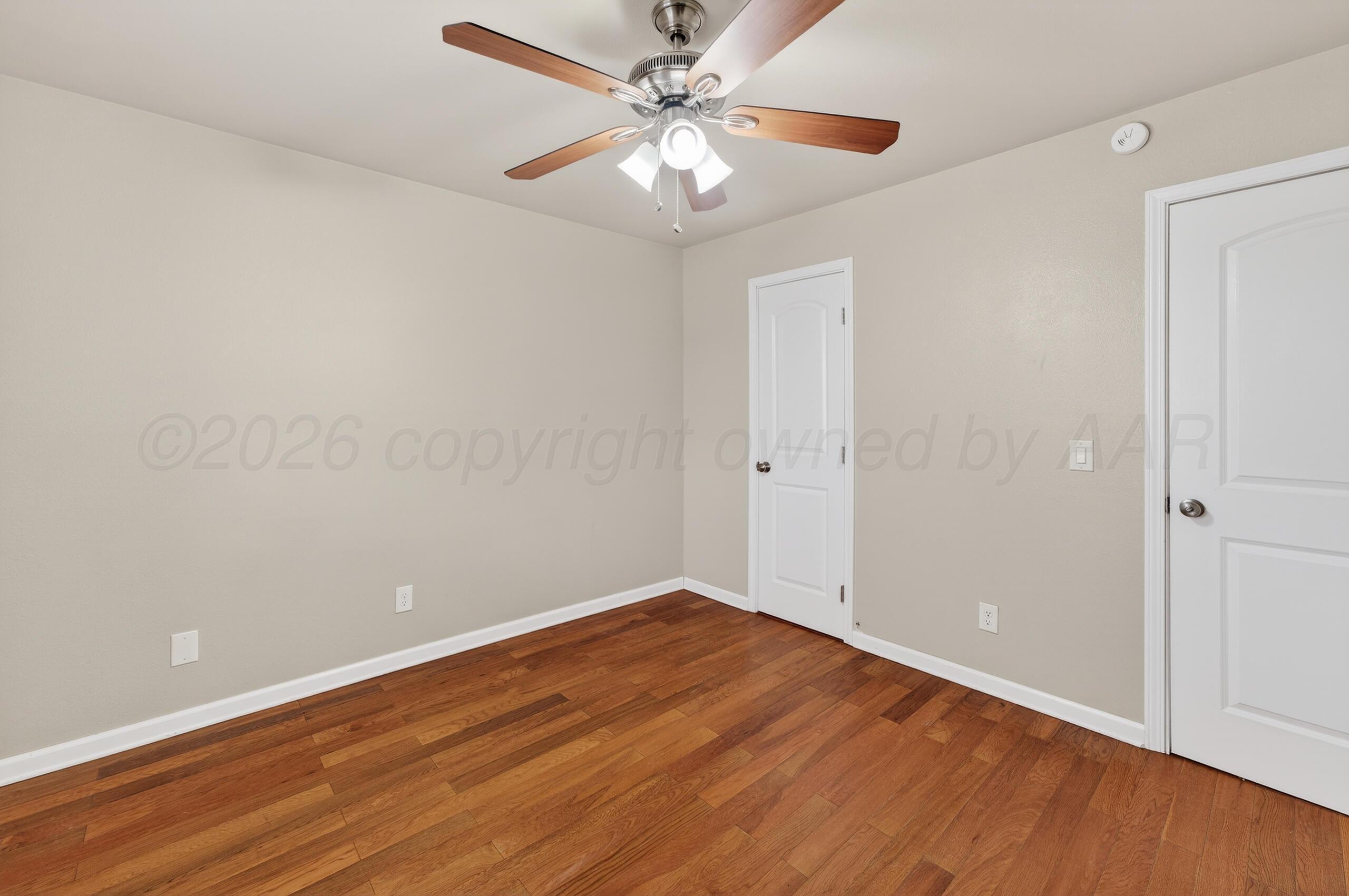 7313 Holyoke Trail Amarillo, TX 79121 - Photo 41 of 56 wooden floor in an empty room