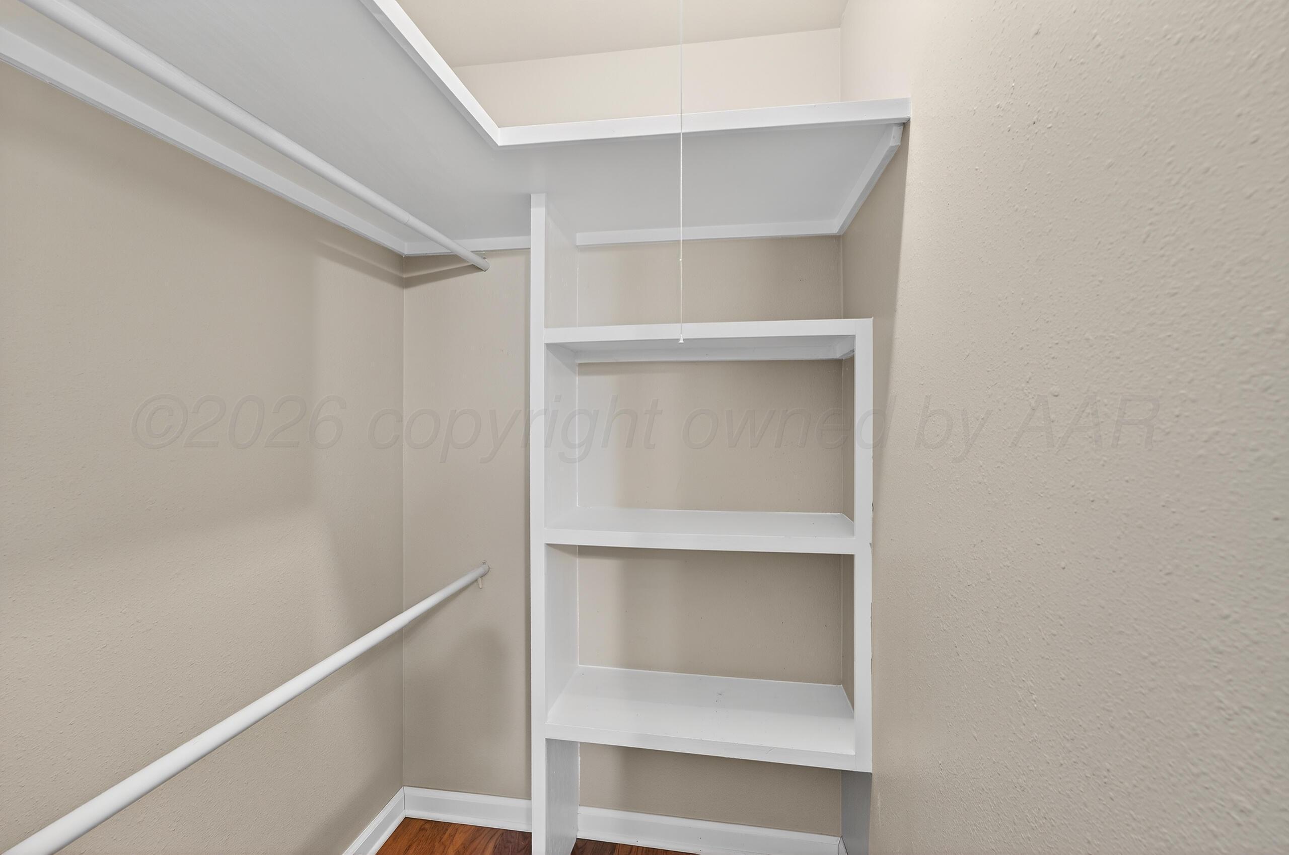 7313 Holyoke Trail Amarillo, TX 79121 - Photo 43 of 56 a view of an empty walk in closet