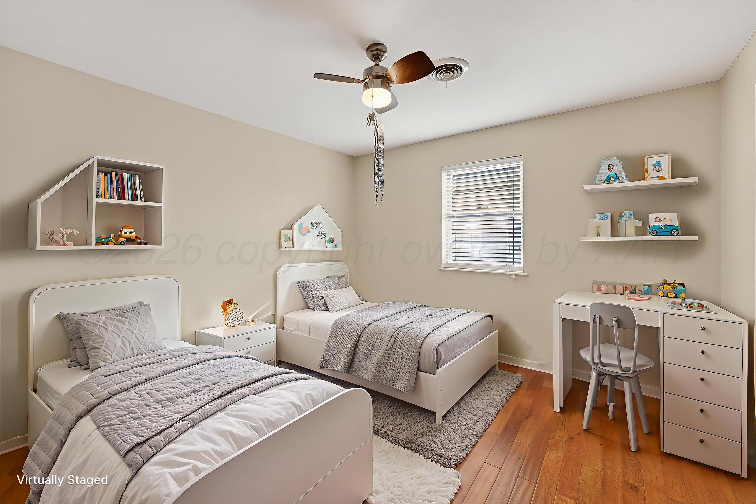 7313 Holyoke Trail Amarillo, TX 79121 - Photo 47 of 56 a bedroom with two beds and a chandelier