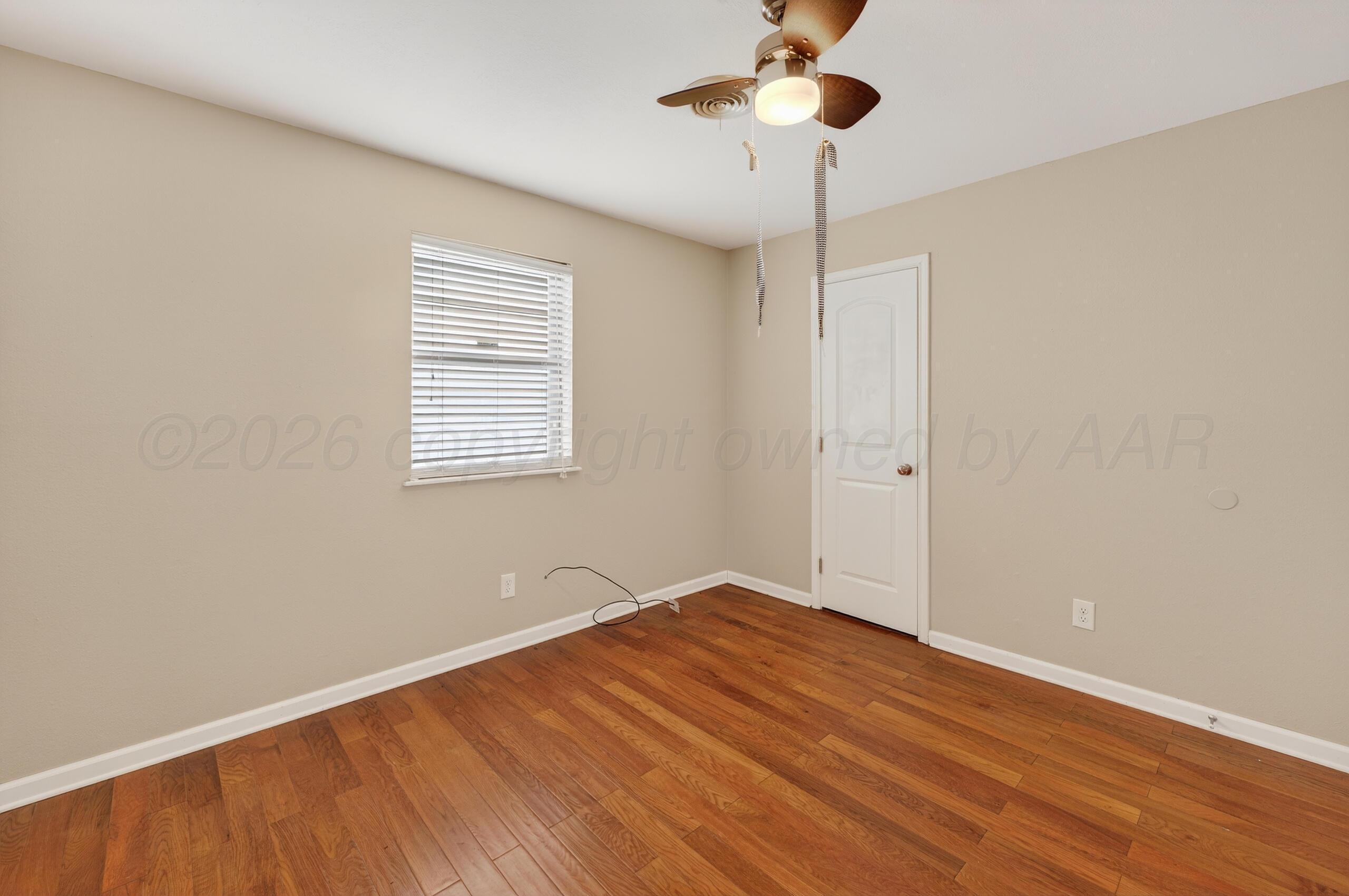 7313 Holyoke Trail Amarillo, TX 79121 - Photo 50 of 56 a view of an empty room with a window