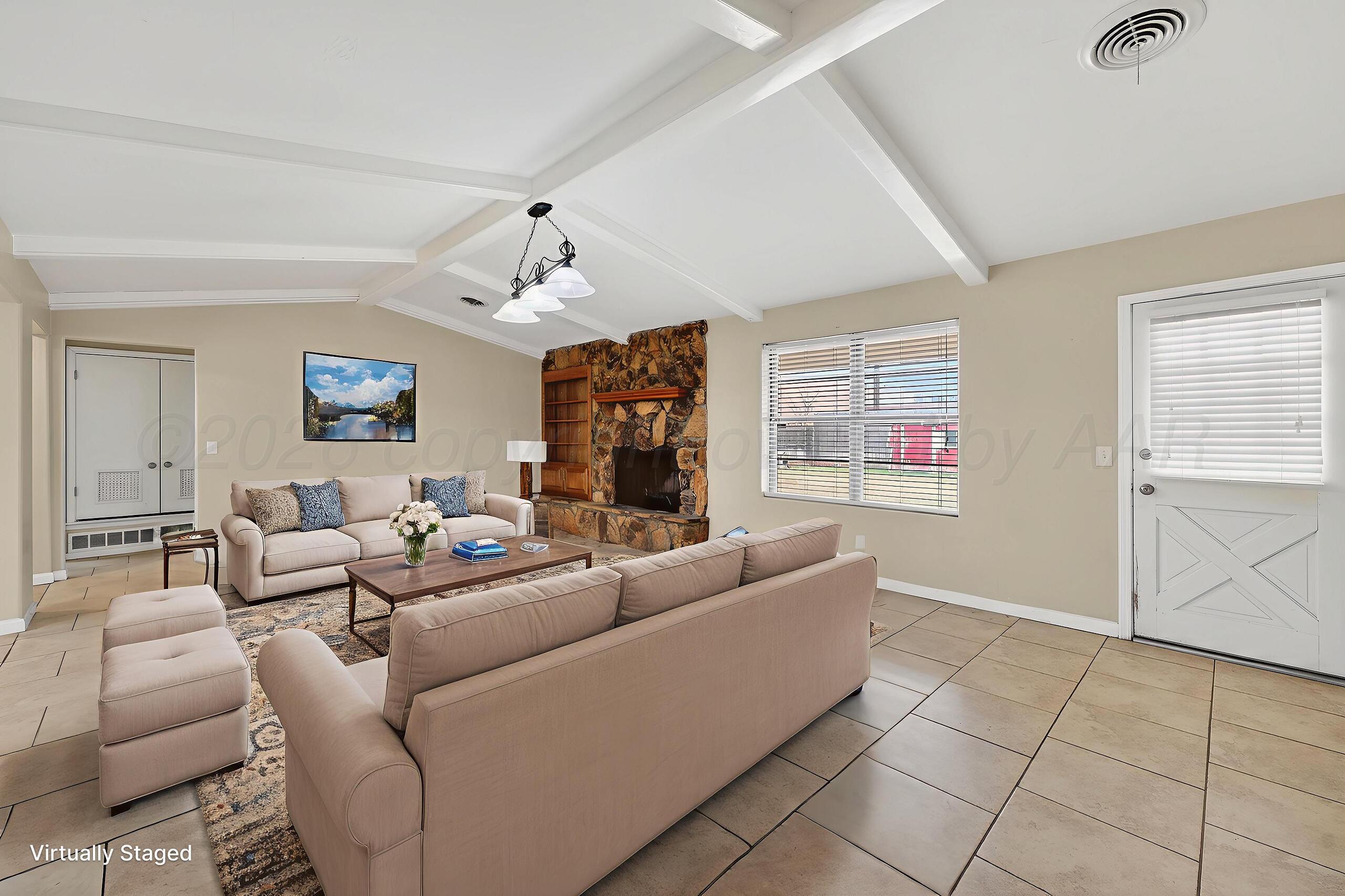 7313 Holyoke Trail Amarillo, TX 79121 - Photo 10 of 56 a living room with furniture and a window