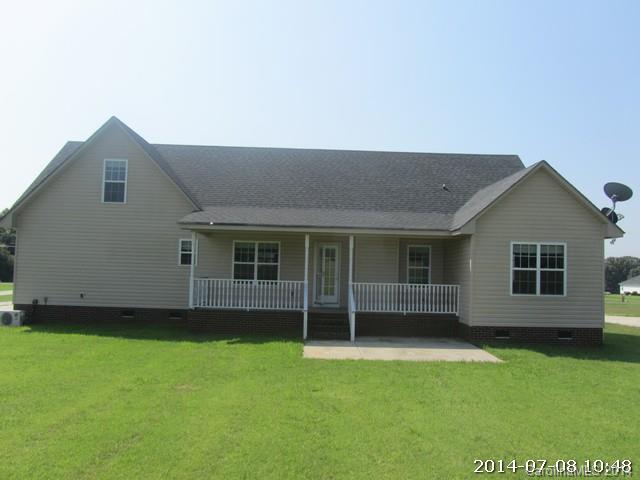 2904 Ruben Road, Unit 3 Monroe, NC 28112 - Photo 2 of 9 front view of a house with a yard