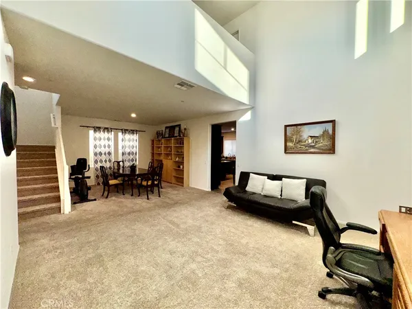 a view of a livingroom with furniture and a couch