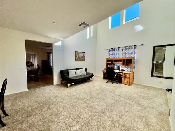 a view of a livingroom with furniture and a livingroom