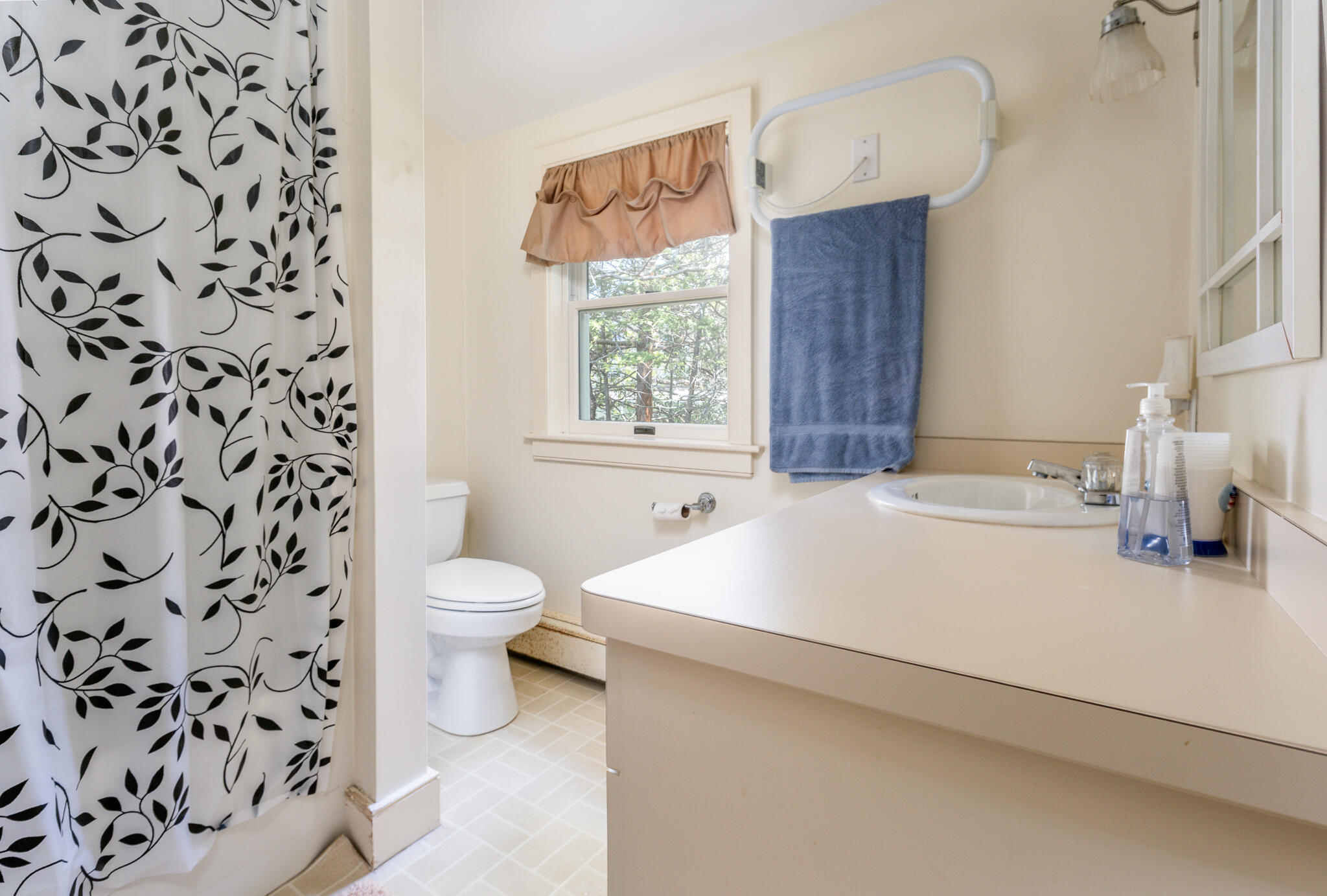 46 Great Bay Road Osterville, MA 02655 - Photo 30 of 54 a bathroom with a sink a toilet and shower curtain