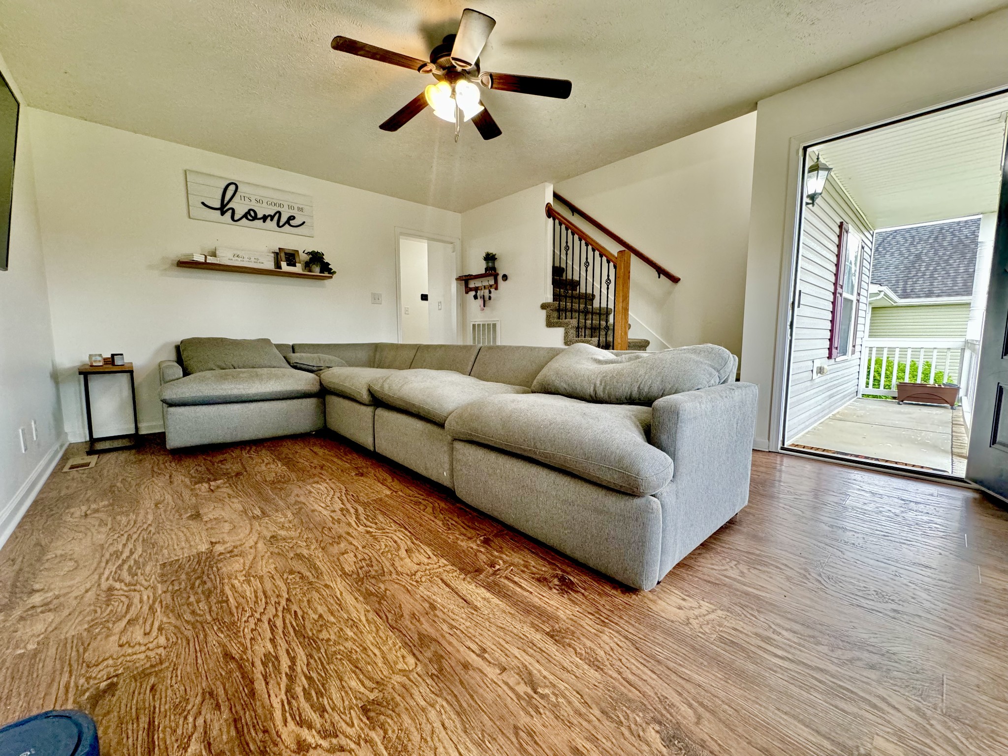 3769 Suiter Road Clarksville, TN 37040 - Photo 2 of 10 a living room with furniture and a wooden floor