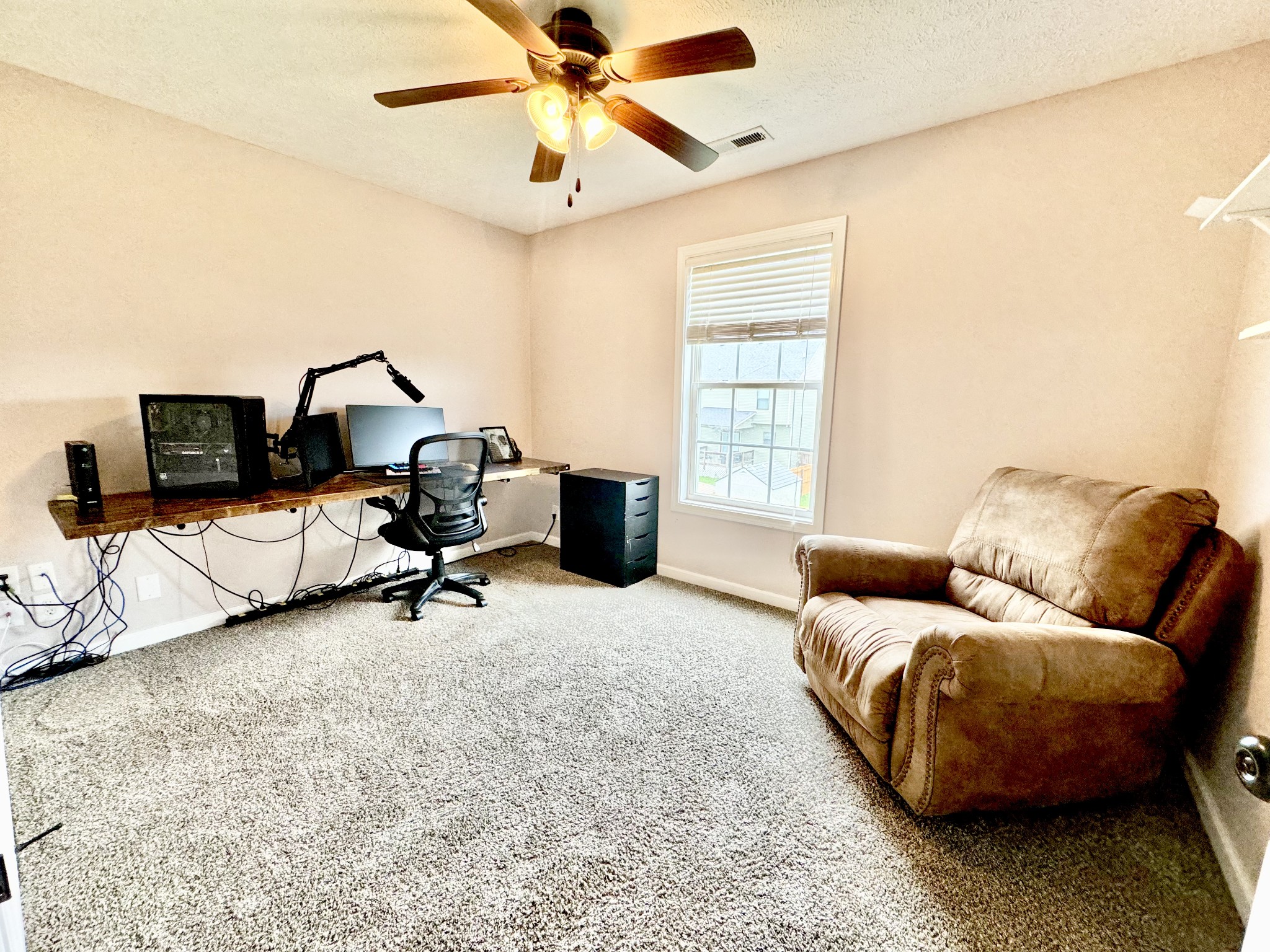 3769 Suiter Road Clarksville, TN 37040 - Photo 10 of 10 a living room with furniture and a window