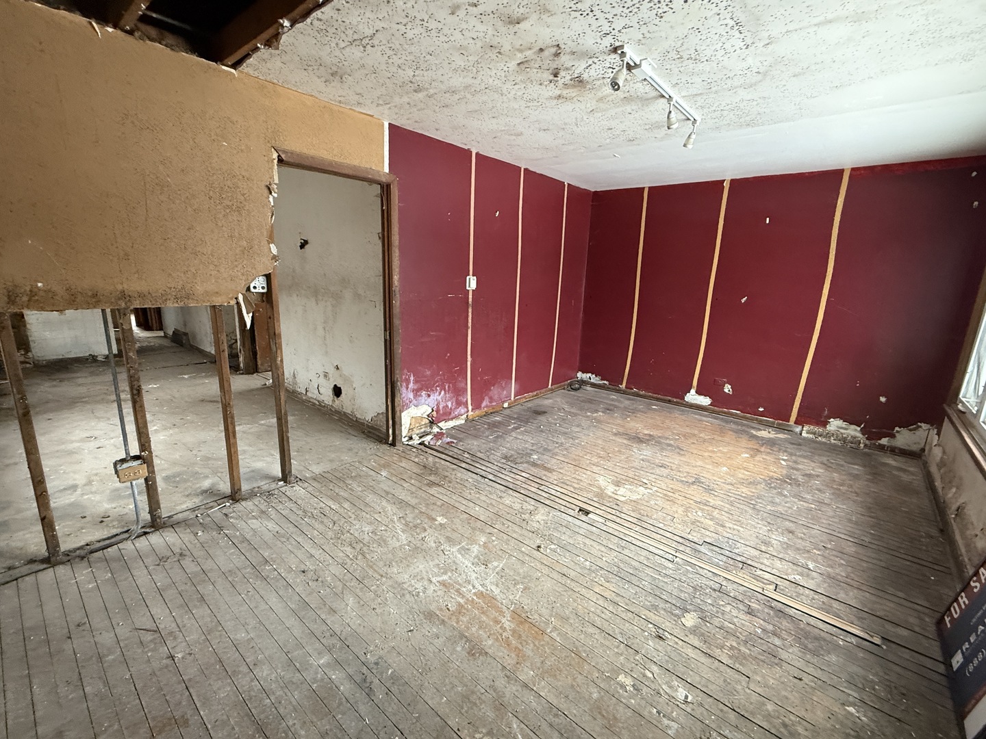 1237 East 95th Street Chicago, IL 60628 - Photo 3 of 11 a view of a room with wooden floor and chair
