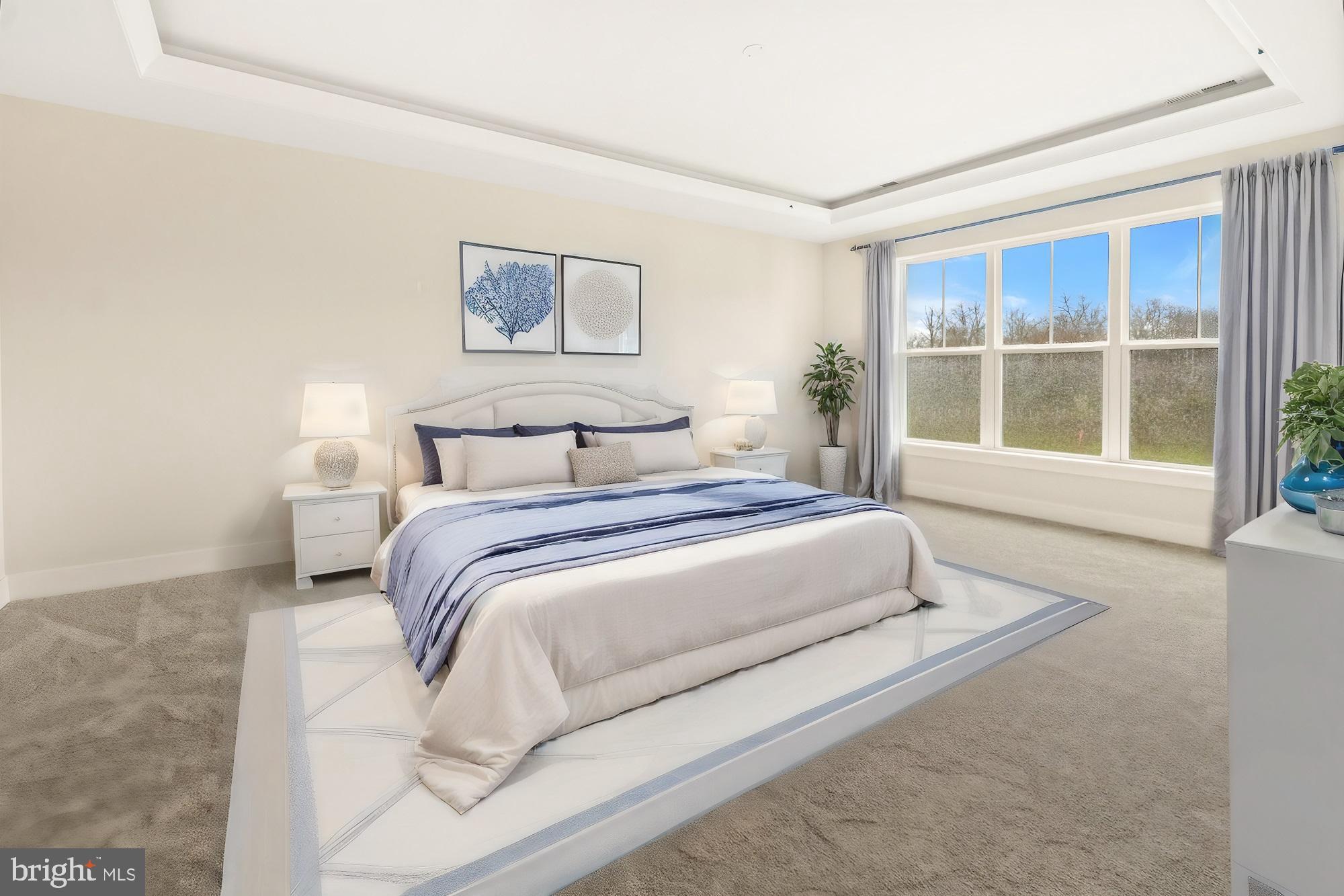 11310 Ingels Court Issue, MD 20645 - Photo 5 of 11 a bedroom with a large bed and a large window