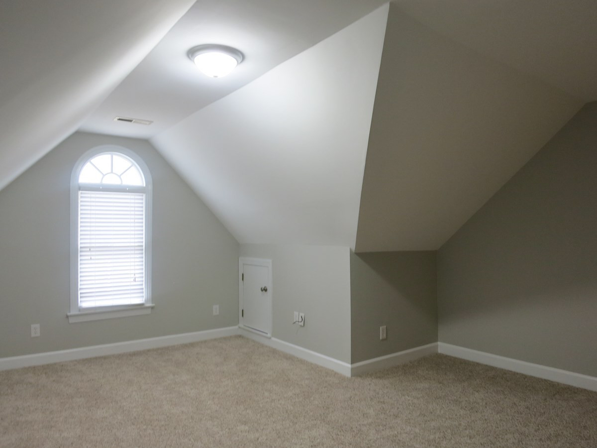 9305 Dawnshire Road Raleigh, NC 27615 - Photo 13 of 25 The 2nd floor has neutral carpet throughout. The spacious Bonus Rm has shelving & access to 2 under-eaves Attic storage areas. Bonus Room