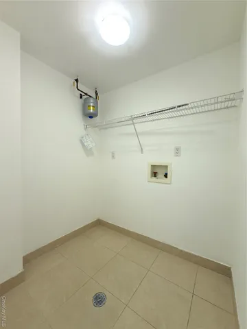 a view of a room with racks on the wall