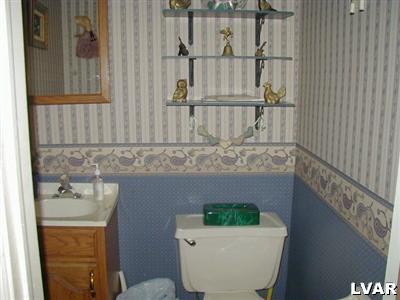 3396 Blue Ridge Road Saylorsburg, PA 18353 - Photo 6 of 11 a bathroom with a sink and mirror