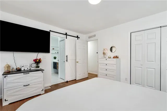 a view of workspace with wooden floor windows