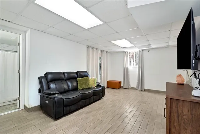 a view of a garage with furniture and a garage