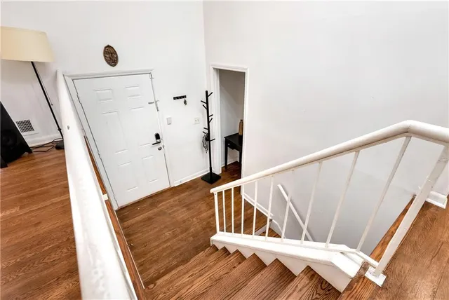 a kitchen view with dining table and chairs