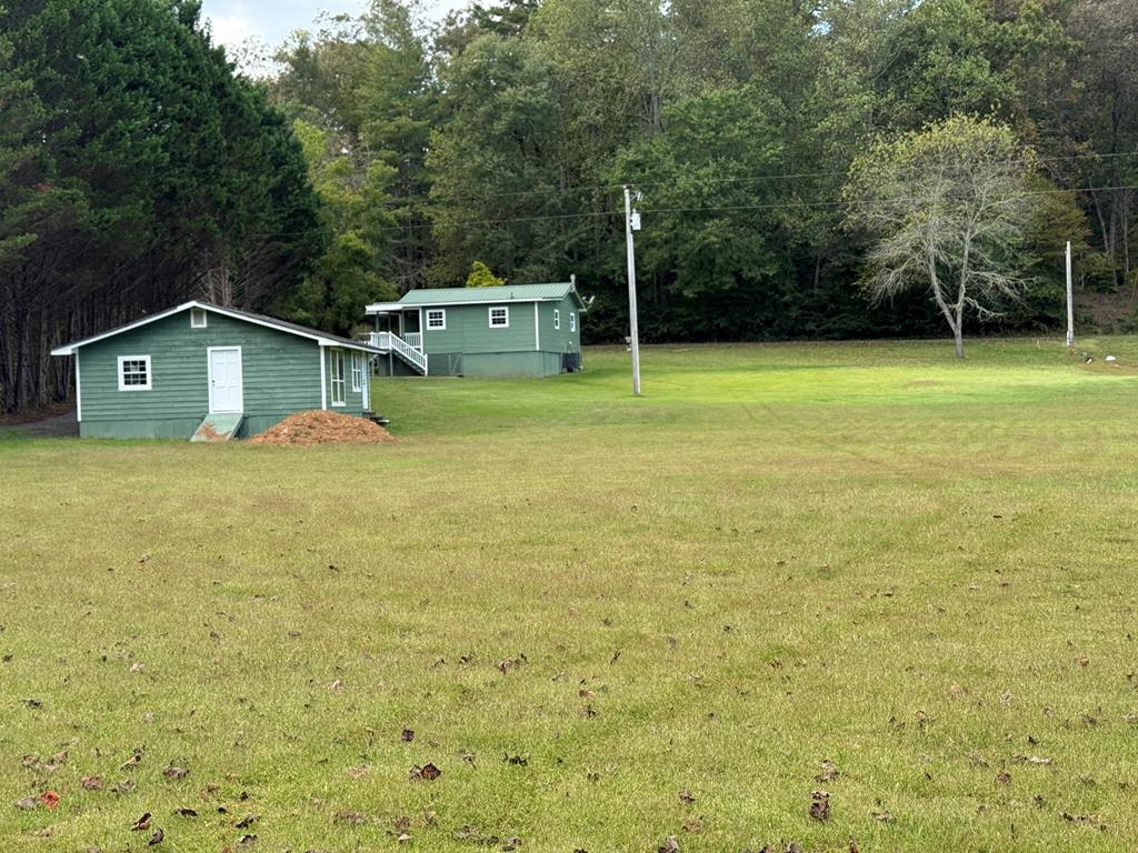 a house with trees in the background