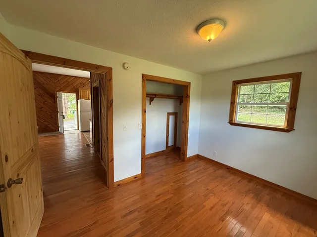 a bathroom with a toilet and a bathtub