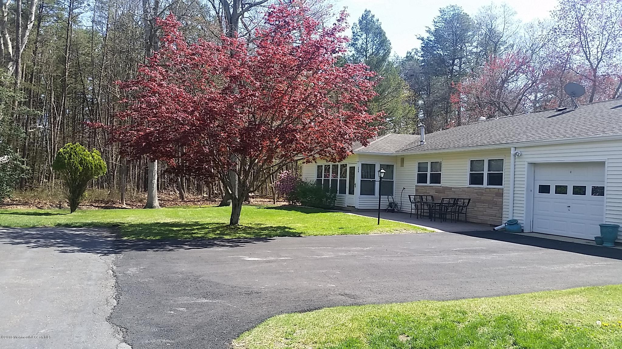 24 East Road, Unit A Jackson, NJ 08527 - Photo 4 of 24 a house with trees in the background