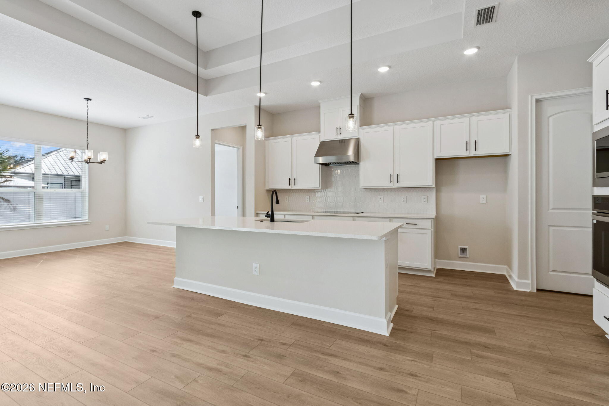 85228 Sandy Rdg Loop, Unit 25 Yulee, FL 32097 - Photo 10 of 23 Kitchen to Dining Room