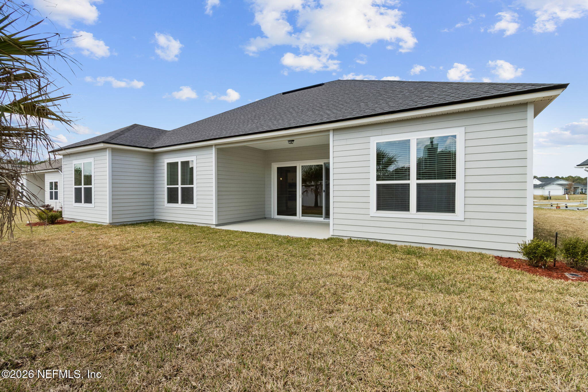 85228 Sandy Rdg Loop, Unit 25 Yulee, FL 32097 - Photo 21 of 23 Covered porch