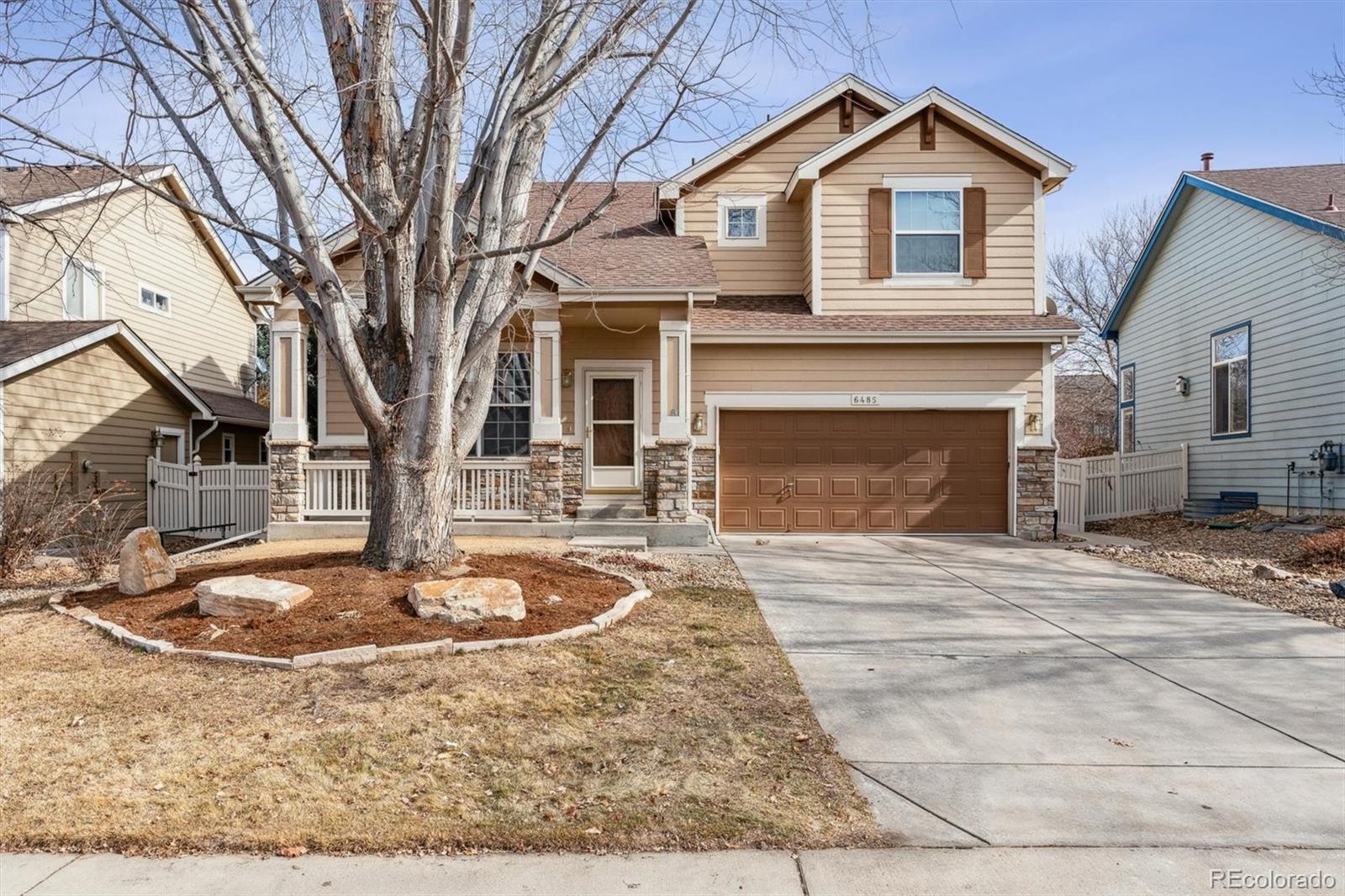 6485 Silverleaf Avenue Firestone, CO 80504 - Photo 1 of 29 a front view of a house with entertaining space