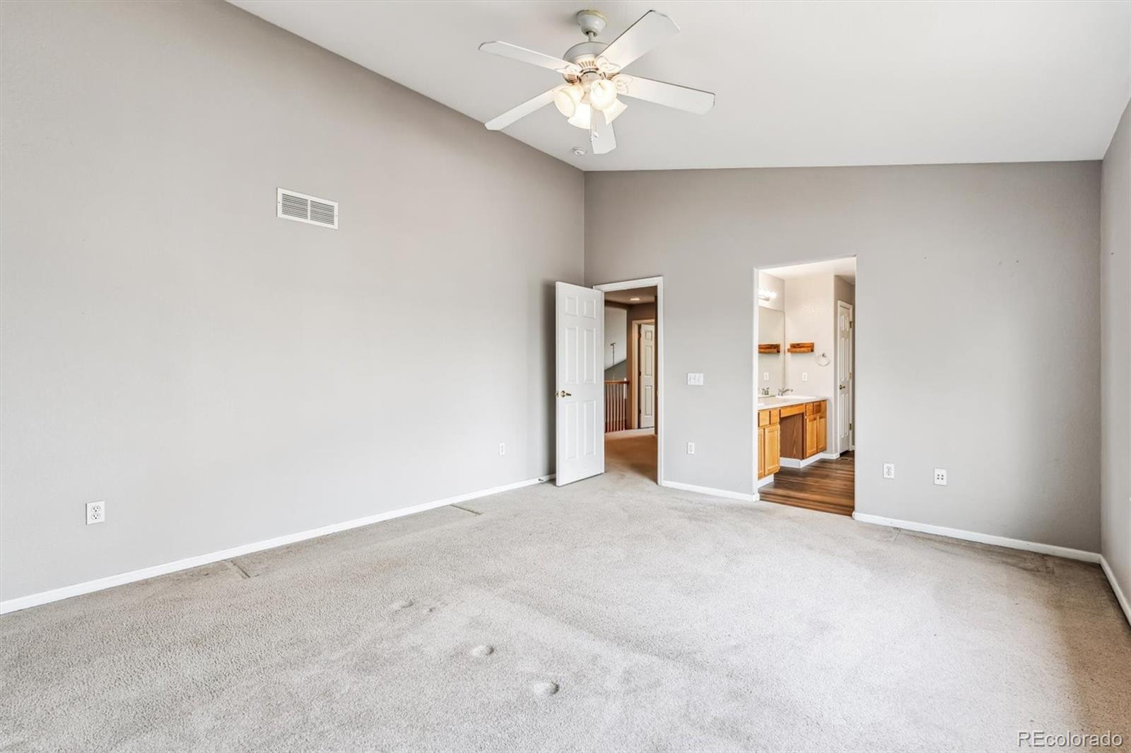 6485 Silverleaf Avenue Firestone, CO 80504 - Photo 19 of 29 an empty room with closet and ceiling fan
