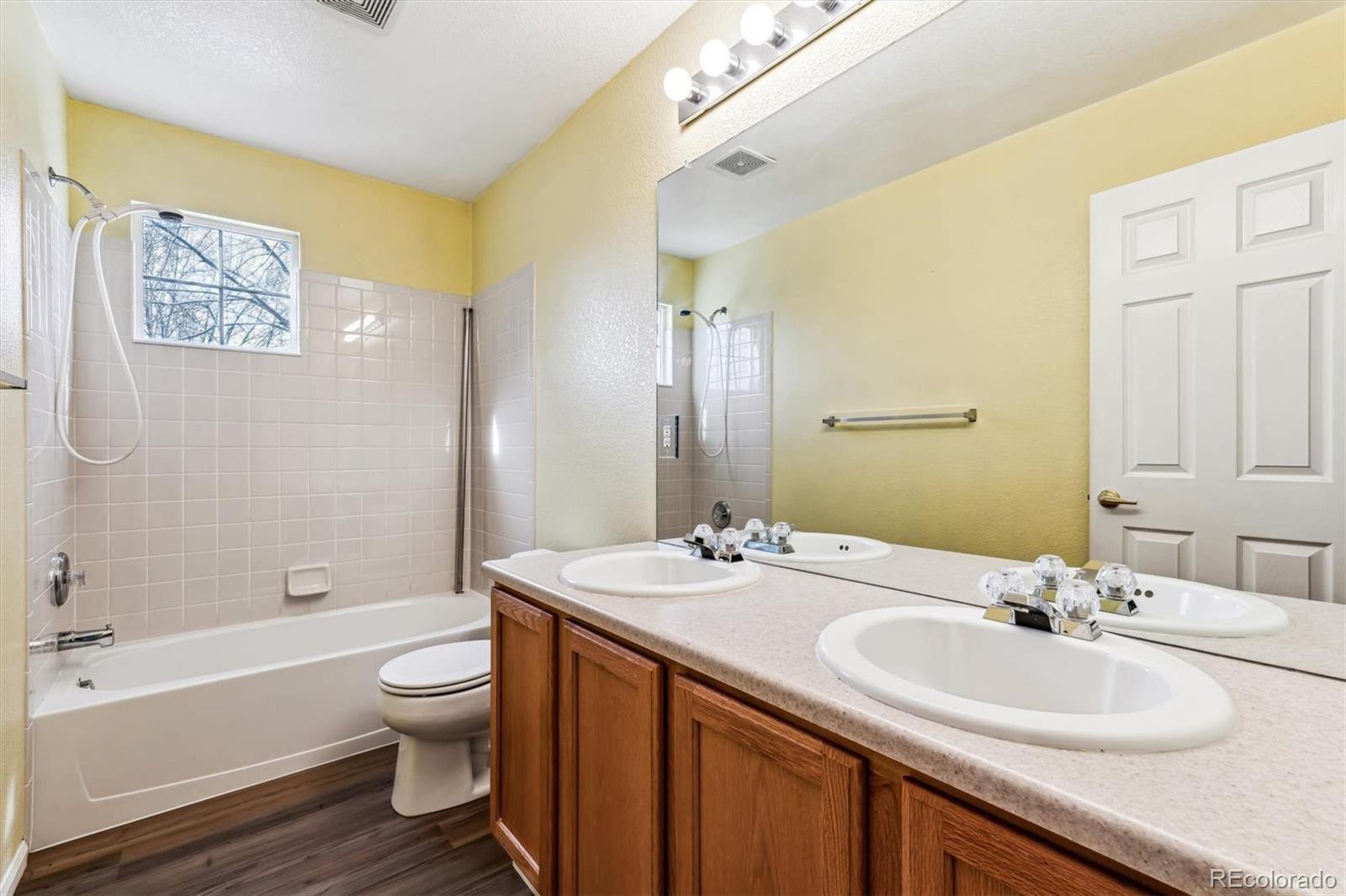 6485 Silverleaf Avenue Firestone, CO 80504 - Photo 20 of 29 a bathroom with a sink and a mirror