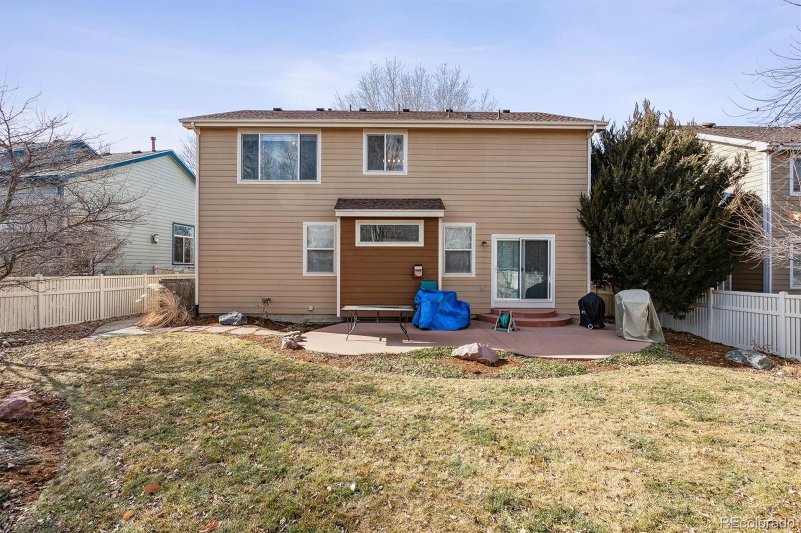 6485 Silverleaf Avenue Firestone, CO 80504 - Photo 22 of 29 a view of a house with a yard and large tree