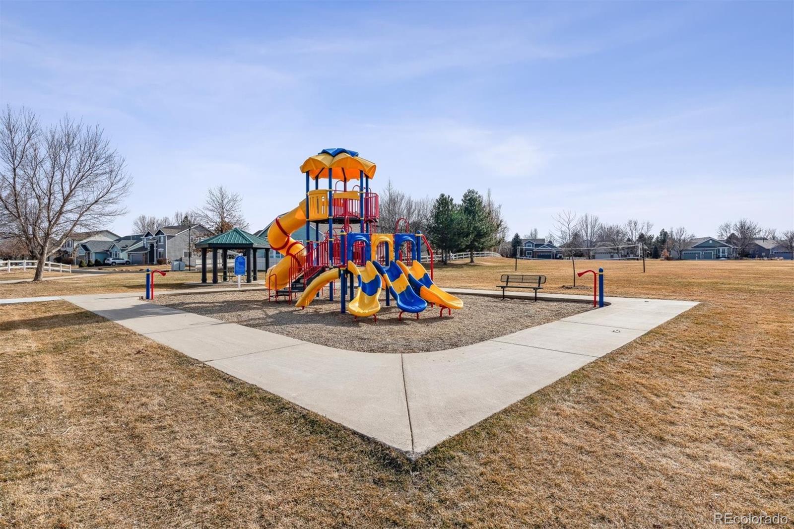 6485 Silverleaf Avenue Firestone, CO 80504 - Photo 28 of 29 a view of a park with swings and slides