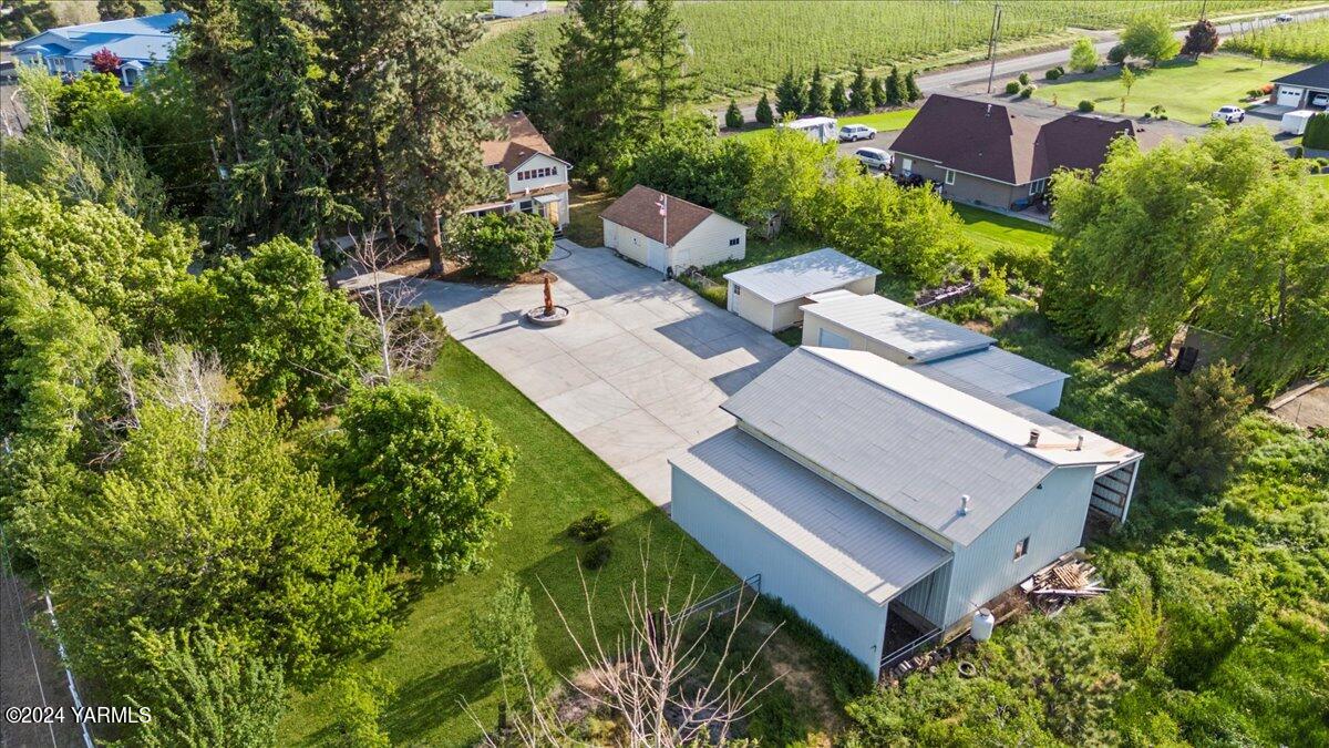 470 Stone Road Yakima, WA 98908 - Photo 3 of 45 an aerial view of a house with a yard