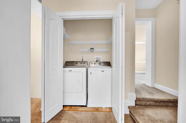 a view of kitchen with wooden floor