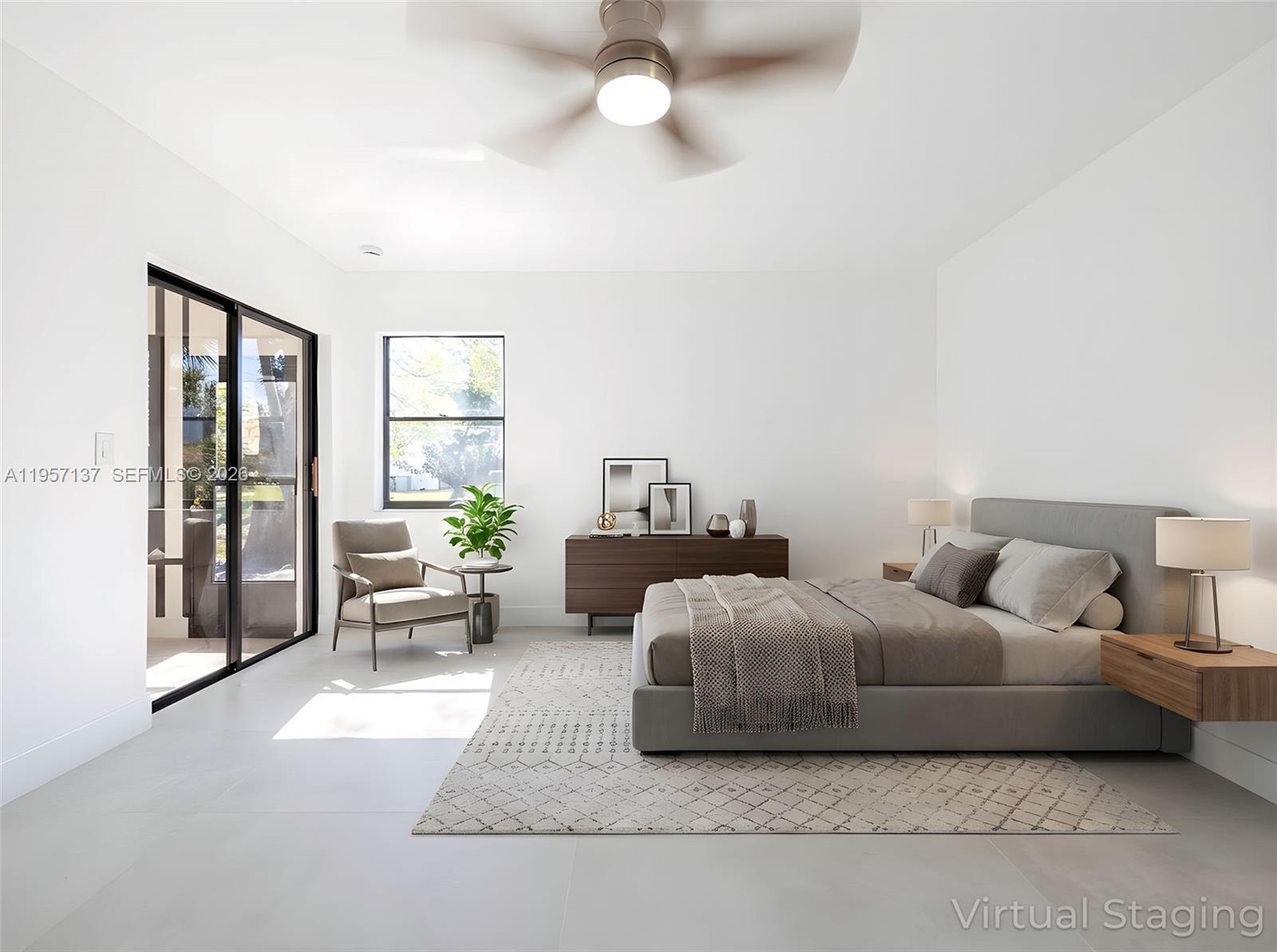 10988 Lake Front Place Boca Raton, FL 33498 - Photo 13 of 85 a living room with furniture and a large window