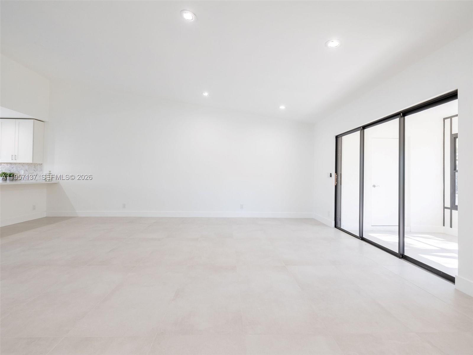 10988 Lake Front Place Boca Raton, FL 33498 - Photo 25 of 85 a view of an empty room with a window