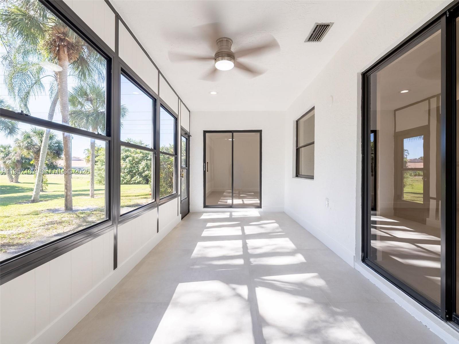 10988 Lake Front Place Boca Raton, FL 33498 - Photo 29 of 85 Expansive Florida Room