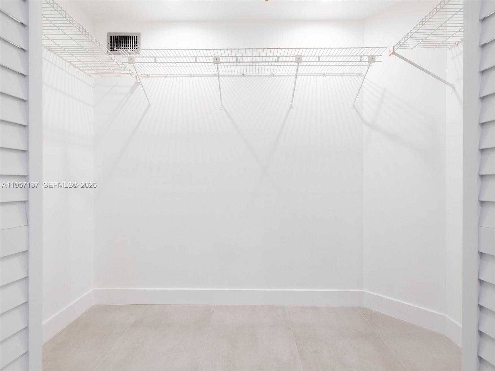 10988 Lake Front Place Boca Raton, FL 33498 - Photo 40 of 85 Spacious walk in closet in Primary Bedroom