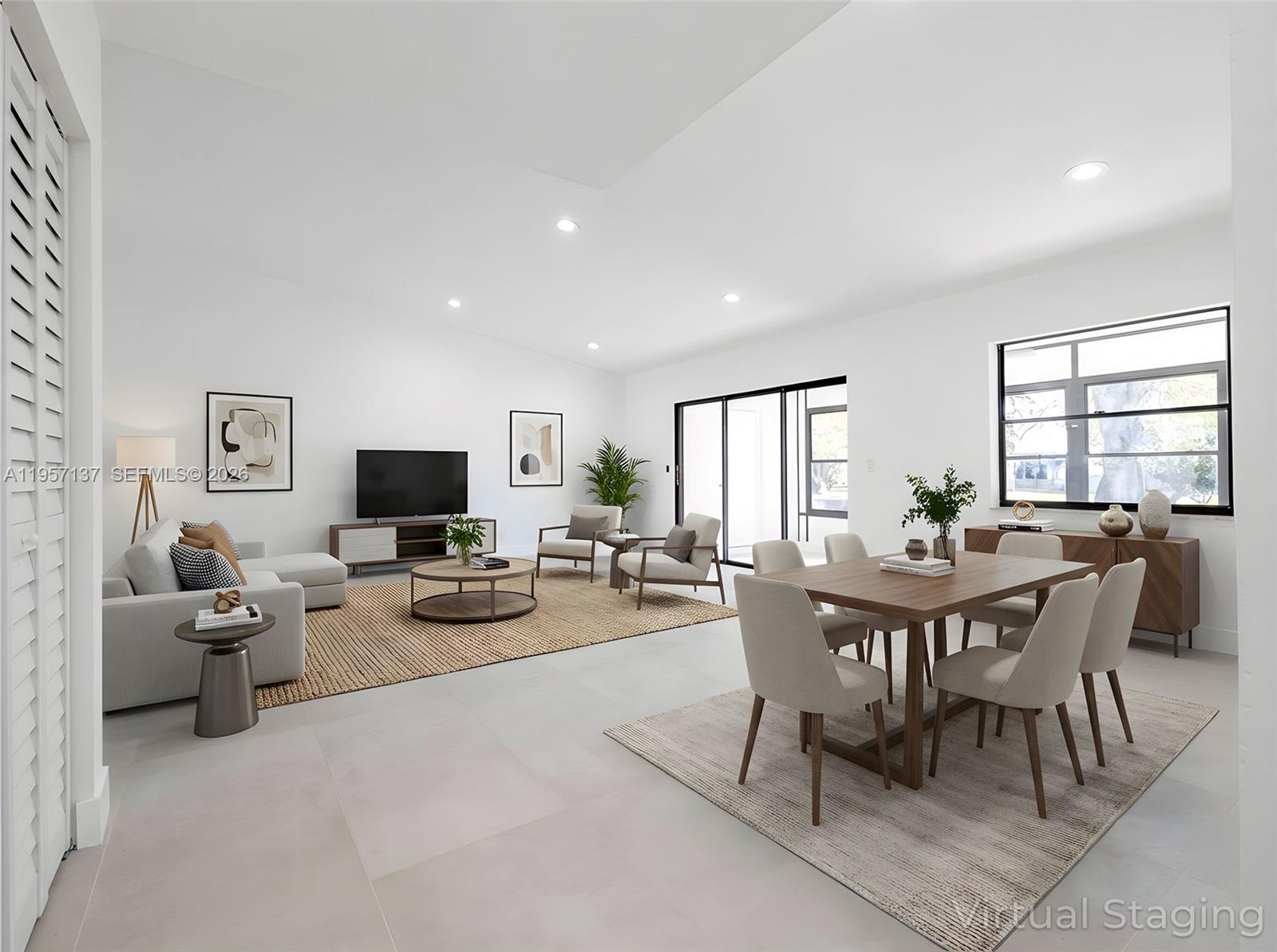 10988 Lake Front Place Boca Raton, FL 33498 - Photo 5 of 85 a view of a dining room with furniture and a livingroom